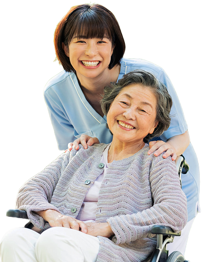 female caregiver and elderly smiling happily