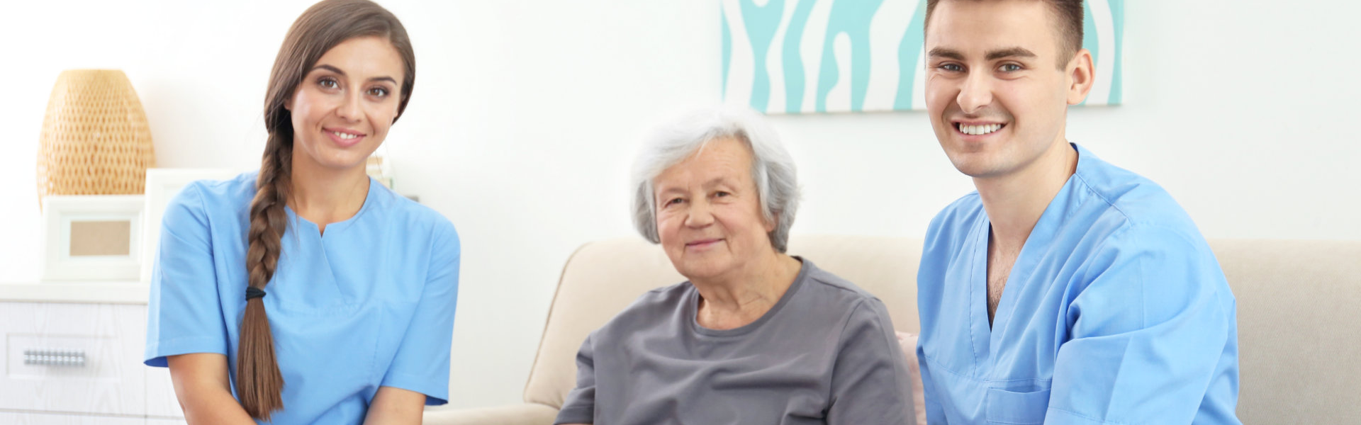 two caregiver and one elderly
